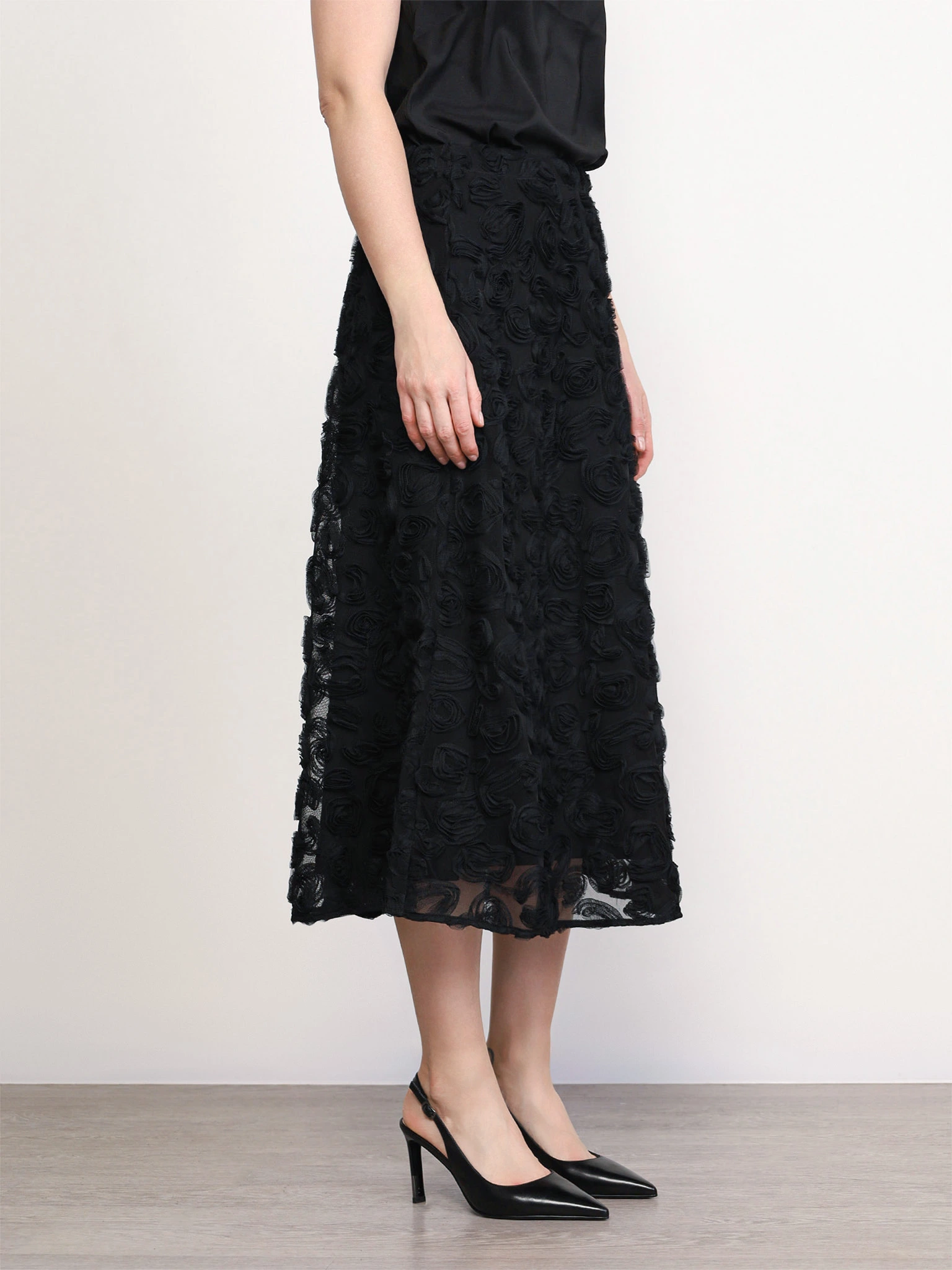 Юбка черного цвета из фактурного трикотажа